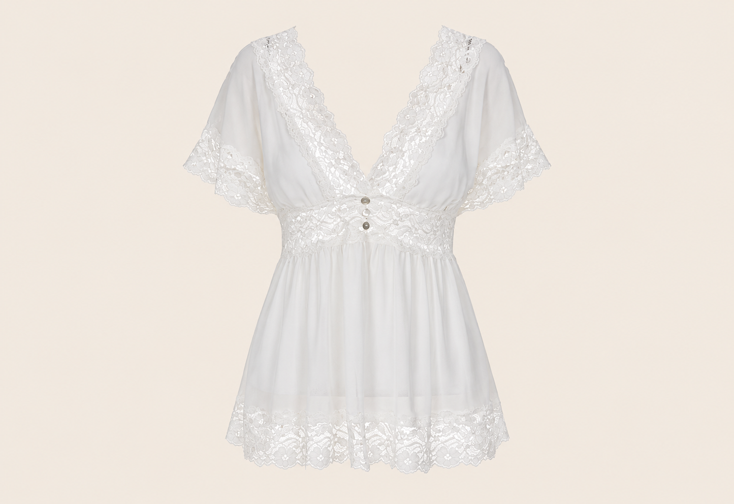 Blouse légère à dentelle — vêtement seul sur fond beige