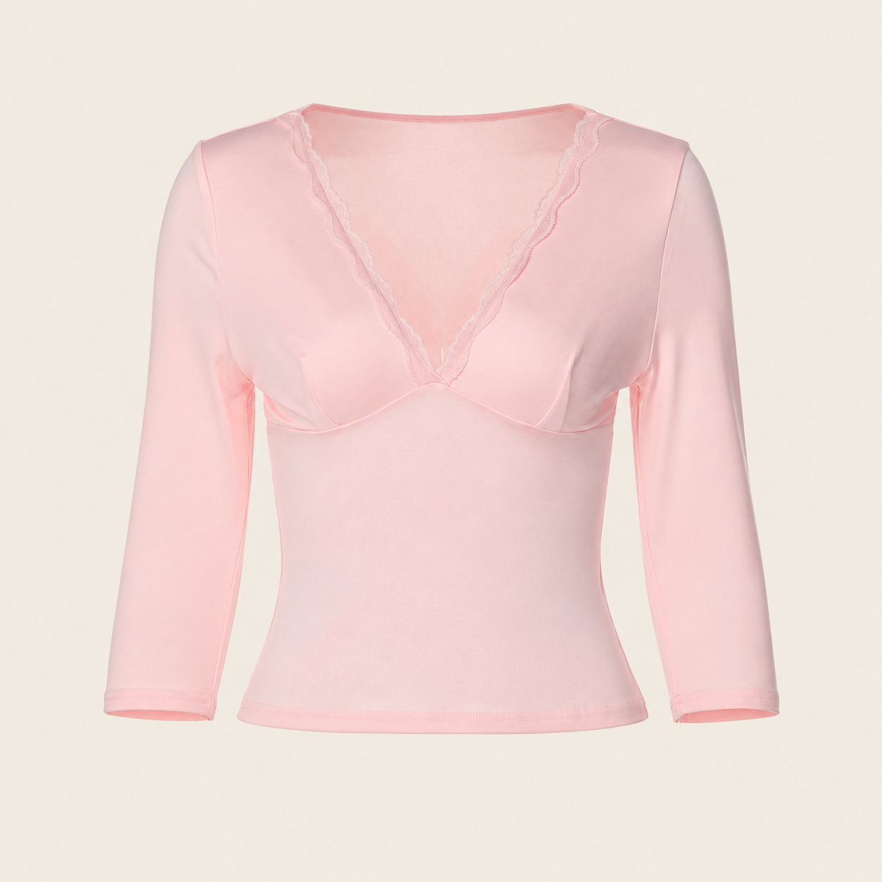 Top en dentelle à col V — vêtement seul sur fond beige