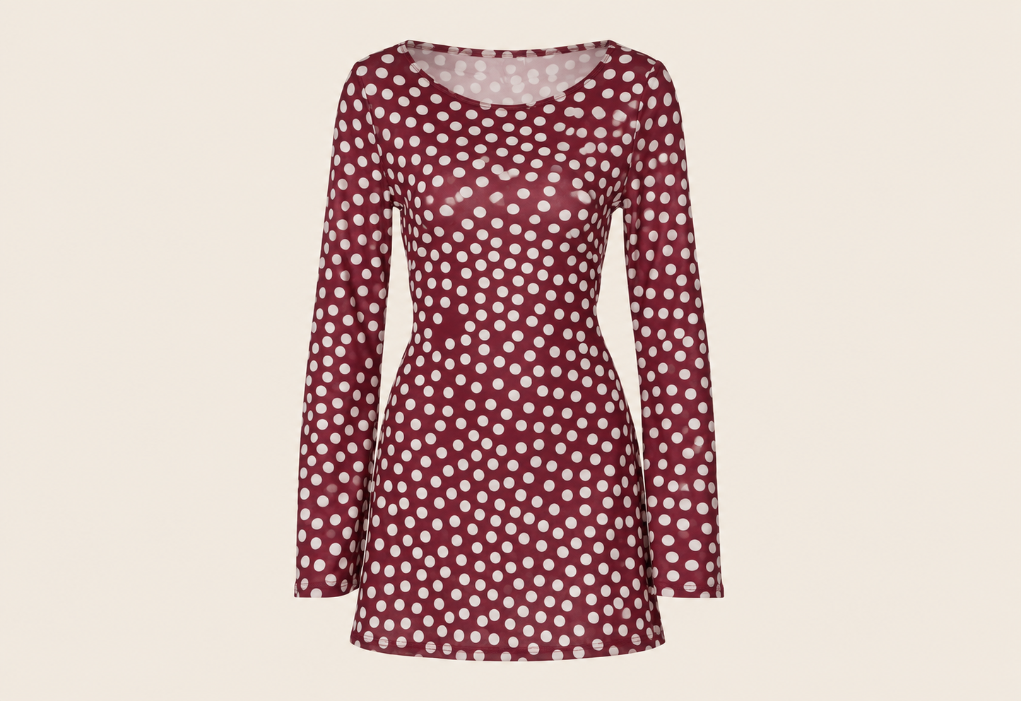 Robe courte à pois et manches longues — vêtement seul sur fond beige