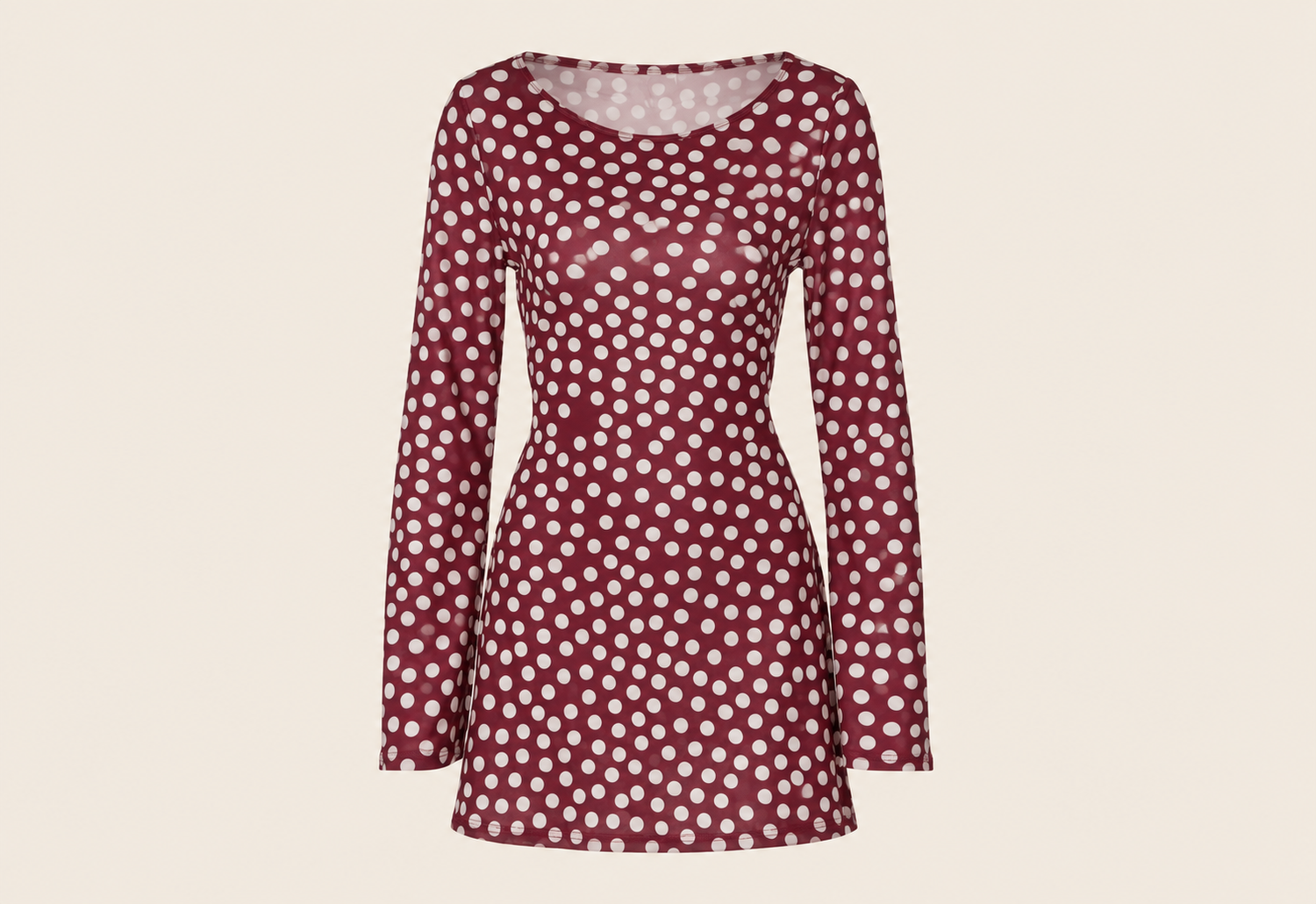 Robe courte à pois et manches longues — vêtement seul sur fond beige